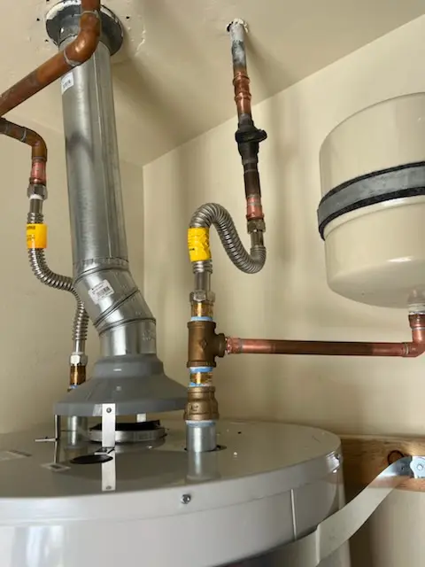 Water heater installation and plumbing repair in Oronoque
